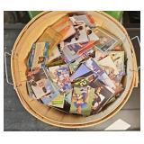 BASKET OF SPORTS CARDS