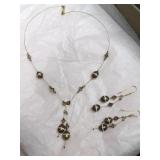 Matching necklace/pendant and earrings