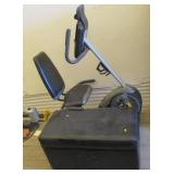 Exercise Bike and Black Chest