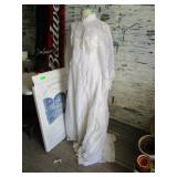 Old- Fashioned Wedding Dress and Cardboard Armoir