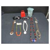 Necklaces, Sun Glasses, Bell and Trash Barrel