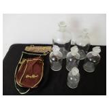 Bottles with Lids and Crown Royal Bags