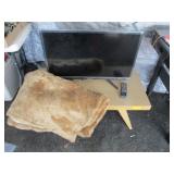 TV, Coffee Table, Blanket