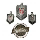 Studebaker and Chevrolet Monte Carlo Emblems