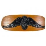 Wall Hanging With Winged Tire Design