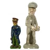 Two Porcelain Figures of Car Drivers
