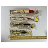 Four Fred Arbogast Fishing Lures in Packaging Four Fred Arbogast Fishing Lures in Packaging