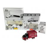 Three Mack Model Trucks with Boxes Three Mack Model Trucks with Boxes