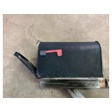 Black Metal Mailbox with Red Flag