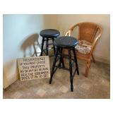 Swivel Stools, Rattan Chair, and Sign