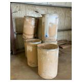 Eight Industrial Trash Barrels