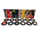 Seven Vinyl Albums and 45 RPM Singles