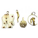 Four 14k Gold Pendants