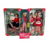 Three Coca-Cola Barbie Collector Dolls