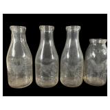 4 Vintage Embossed Milk Bottles