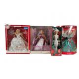 4 Holiday Barbie Dolls