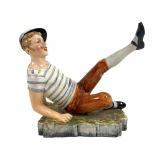 Painted Ceramic Figure of Reclining Boy