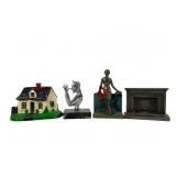 Four Cast Metal Bookends/Doorstops