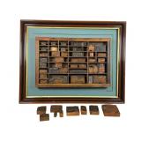 Framed Collection of Printing Stamps