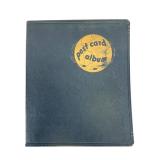 Two Partially Filled Postcard Binders