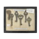 Display of 6 Brass 18th Century Keys