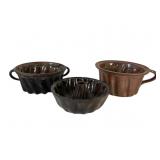 Three Glazed Pottery Cake Pans