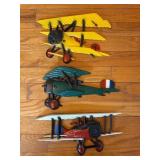 Three Aluminum Biplane Wall Hangings