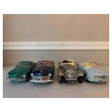 Four Diecast Cars and Trucks
