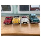 Four Die-Cast Model Cars