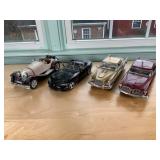 Four Die-Cast Model Cars