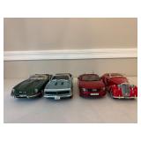 Four Diecast Cars and Trucks