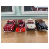 Four Die-Cast Model Cars