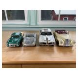 Four Die-Cast Model Cars