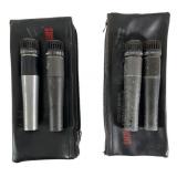 Four Shure Microphones with Cases