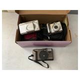 Three Cameras: Canon, Olympus, Vivitar