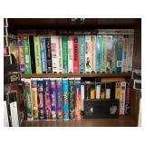 Cabinet With VHS Tapes and CDs