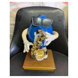 Blue M&M Figure Playing Saxophone