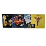 Four Iconic Vinyl Records