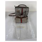 Two Gucci Handbags with Plastic Protector Bag
