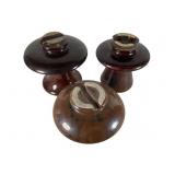 Three Brown Ceramic Insulators