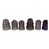 Six Violet Colored Glass Insulators