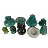 Eight Glass and Porcelain Insulators