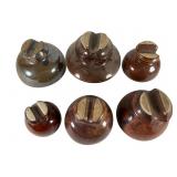 Six Brown Ceramic Electrical Insulators