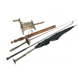 Umbrella, Fencing Foils, and Wooden Reel