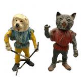 Two German Hyde Cast Metal Nodders