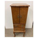 Jewelry cabinet with lift lid, swing out sides