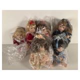 Six 7-Inch Porcelain Dolls in Packaging
