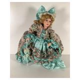 Porcelain Doll in Turquoise and Pink Dress