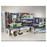 11 Hess Toy Trucks and Helicopter