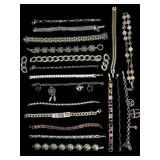 18 Silver Toned Bracelets